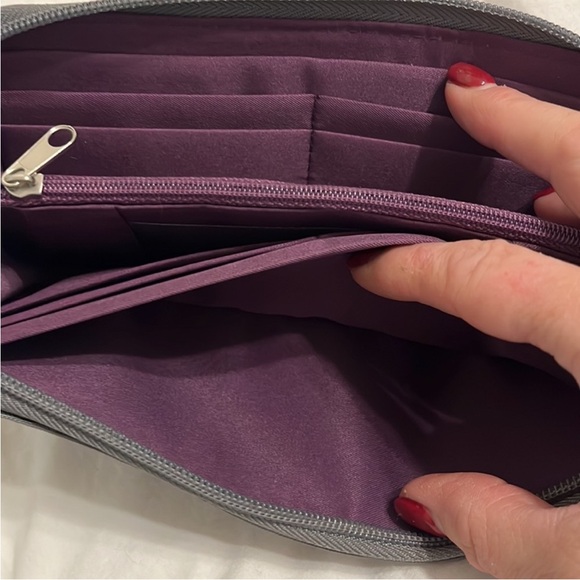 New Gray Women's Travelon Wallet Purple inside
Never Used Perfect Condition - Picture 7 of 8
